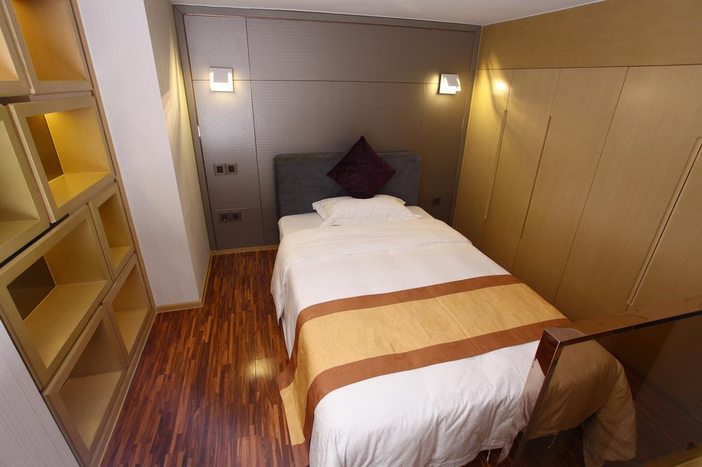 Heefun Apartment Hotel Guangzhou - Poly D Plaza Branch Rum bild